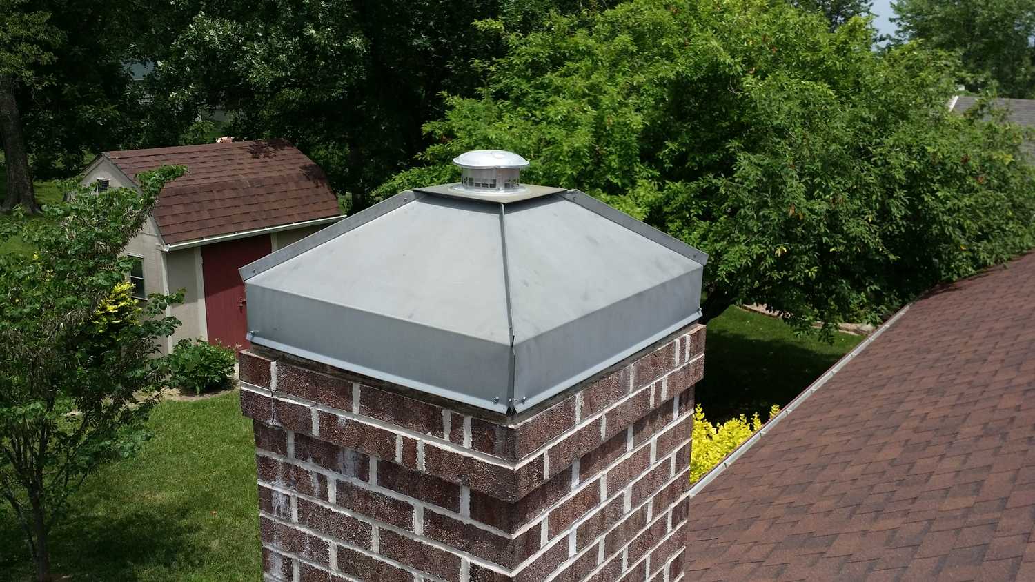 Custom chimney cap experts in Columbia, Mo! Call Accurate Heating & Cooling today! 