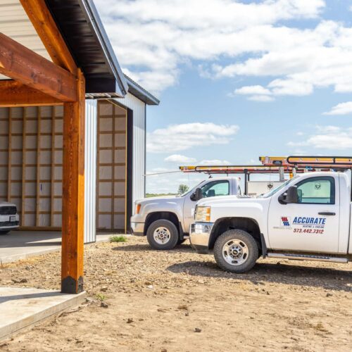 Two Accurate Heating and Cooling trucks on a new construction job.